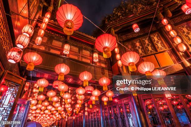 red chinese lanterns hanging in jinli street - chengdu - chinese lantern festival stock pictures, royalty-free photos & images