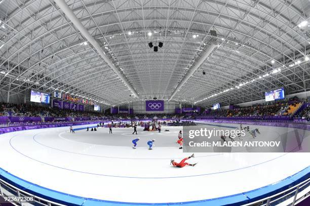 Switzerland's Ramona Haerdi falls in the women's mass start semi-final speed skating event during the Pyeongchang 2018 Winter Olympic Games at the...