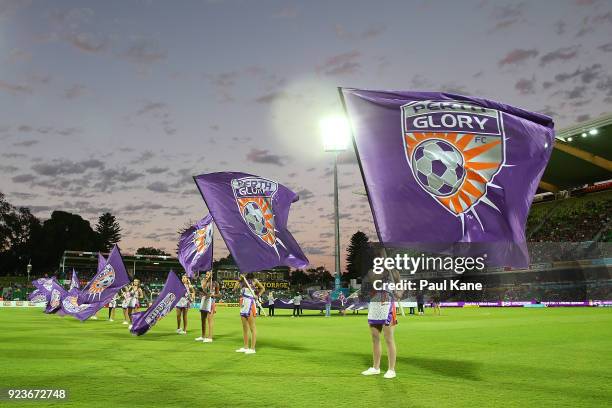 Dancers wave flags before the players walk onto the pitch during the round 21 A-League match between the Perth Glory and Melbourne City FC at nib...