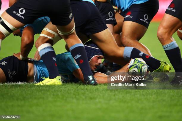 Michael Wells of the Waratahs lays the ball back in a ruck during the round two Super Rugby match between the Waratahs and the Stormers at Allianz...