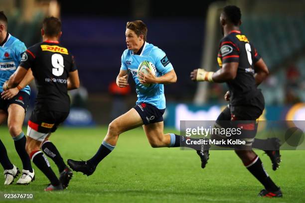 Alex Newsome of the Waratahs runs the ball during the round two Super Rugby match between the Waratahs and the Stormers at Allianz Stadium on...