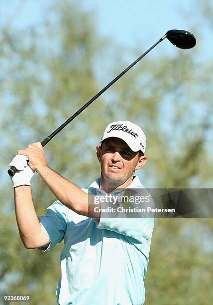 Greg Chalmers hits a tee shot on the ninth hole green during the second round of the Frys.com Open at Grayhawk Golf Club on October 23, 2009 in...