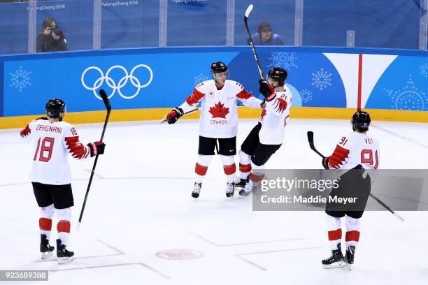 Marc-Andre Gragnani, Mat Robinson, Mason Raymond and Linden Vey of Canada celebrate after a goal in the first period against Czech Republic during...