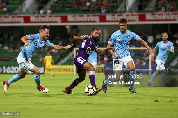Diego Castro of the Glory controls the ball against Dario Vidosic of Melbourne during the round 21 A-League match between the Perth Glory and...