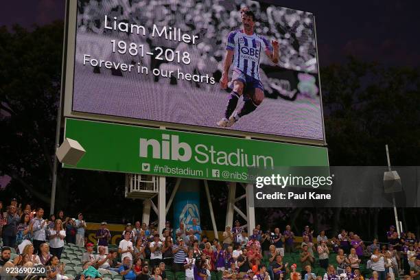 Tribute to Liam Miller is displayed on the screens at the ten minute mark during the round 21 A-League match between the Perth Glory and Melbourne...