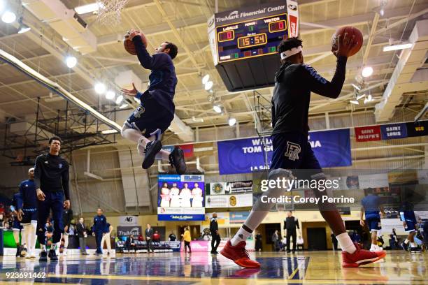 Eric Dadika of the Rhode Island Rams catches some air while warming up before the game against the La Salle Explorers at Tom Gola Arena on February...