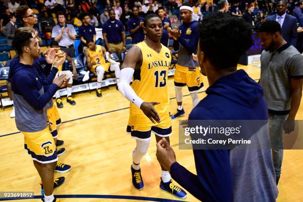 Saul Phiri of the La Salle Explorers is introduced before the game at Tom Gola Arena on February 20, 2018 in Philadelphia, Pennsylvania. Rhode Island...