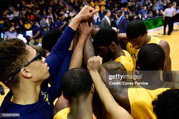 The La Salle Explorers huddles before the game at Tom Gola Arena on February 20, 2018 in Philadelphia, Pennsylvania. Rhode Island edged La Salle...