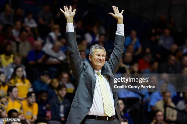 Head coach John Giannini of the La Salle Explorers tells his players to defend, motioning long arms, during the first half at Tom Gola Arena on...
