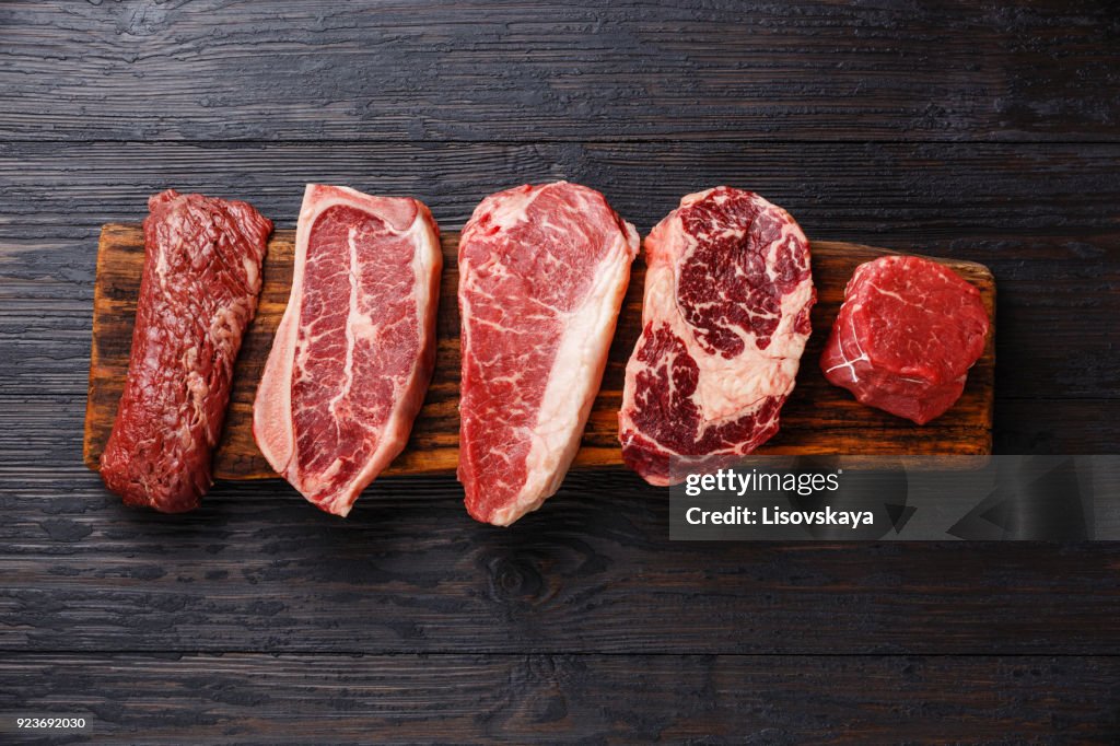 Variety of Raw Black Angus Prime meat steaks