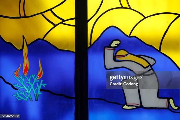 Kon Tum Cathedral. Stained glass window. Moses and the Burning Bush. Kon Tum, Vietnam.