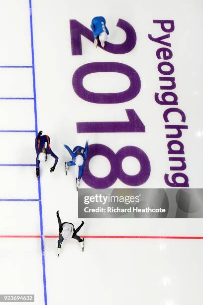 Nana Takagi of Japan crosses the finish line ahead of Bo-Reum Kim of Korea and Irene Schouten of the Netherlands to win the gold medal during the...