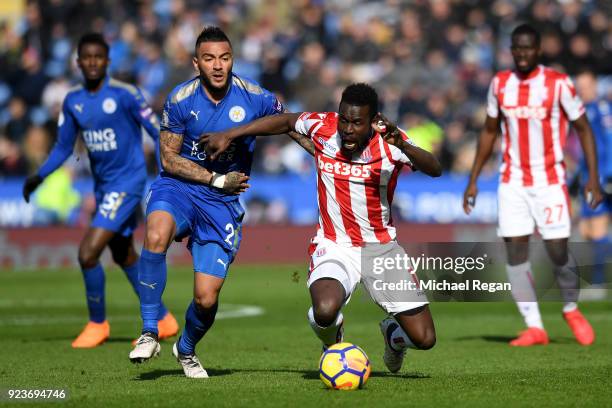 Mame Biram Diouf of Stoke City is challenged by Danny Simpson of Leiceter City during the Premier League match between Leicester City and Stoke City...