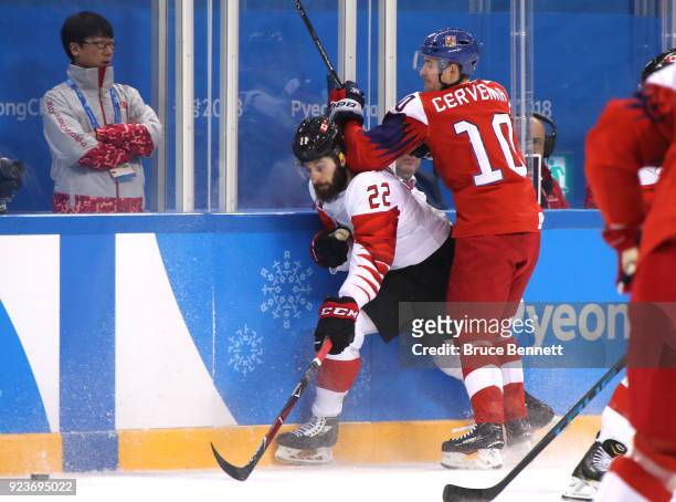 Roman Cervenka of the Czech Republic collides with Eric O'Dell of Canada in the first period during the Men's Bronze Medal Game on day fifteen of the...