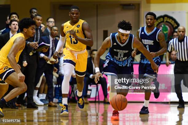 Matthews of the Rhode Island Rams eyes the ball against the La Salle Explorers during the first half at Tom Gola Arena on February 20, 2018 in...