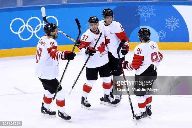 Marc-Andre Gragnani, Mat Robinson, Mason Raymond and Linden Vey of Canada celebrate after a goal in the first period against Czech Republic during...