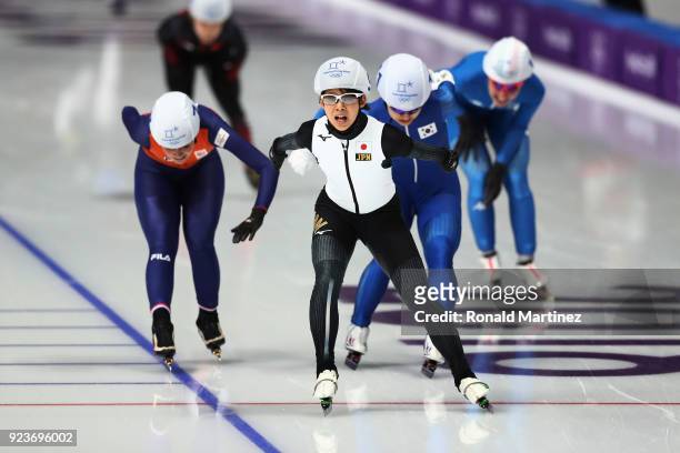 Nana Takagi of Japan crosses the finish line ahead of Bo-Reum Kim of Korea and Irene Schouten of the Netherlands to win the gold medal during the...