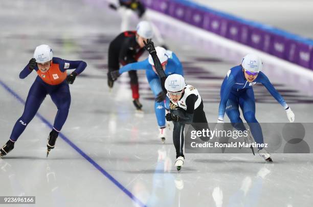 Nana Takagi of Japan races to the finish line ahead of Bo-Reum Kim of Korea and Irene Schouten of the Netherlands to win the gold medal during the...