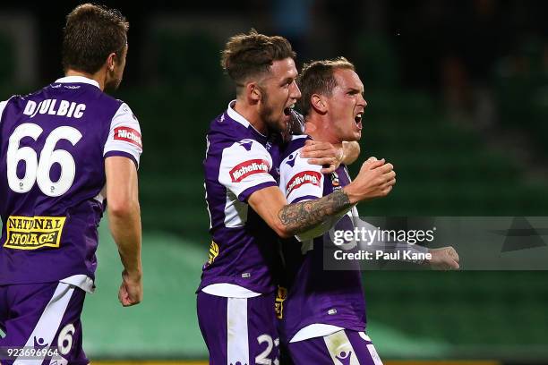 Neil Kilkenny of the Glory celebrates with Scott Neville after scoring a goal during the round 21 A-League match between the Perth Glory and...