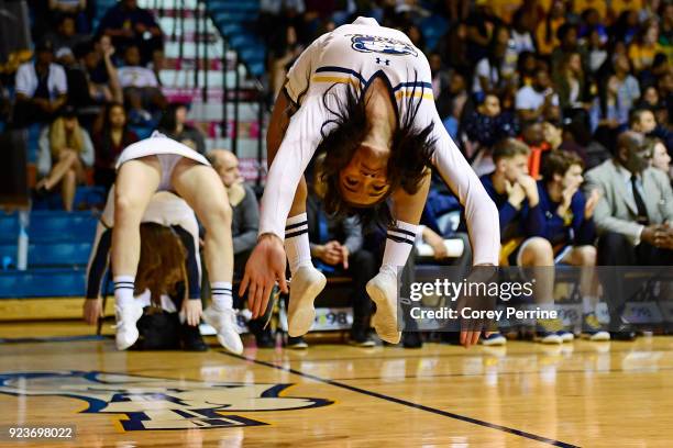 The La Salle Explorers cheerleaders hit backflips after a free throw is scored during the first half at Tom Gola Arena on February 20, 2018 in...