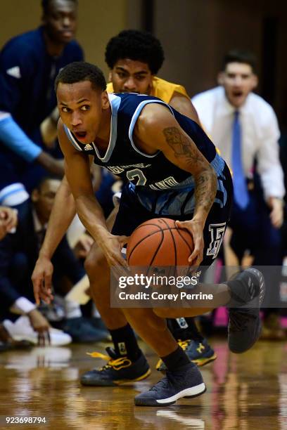 Fatts Russell of the Rhode Island Rams dribbles against the La Salle Explorers during the first half at Tom Gola Arena on February 20, 2018 in...