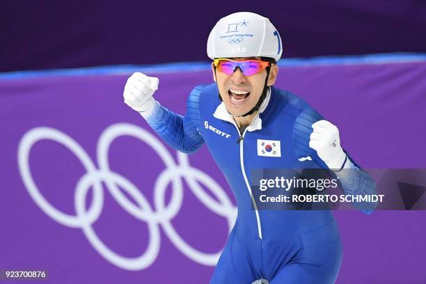 South Korea's Lee Seung-Hoon celebrates his gold medal win in the men's mass start final speed skating event during the Pyeongchang 2018 Winter...