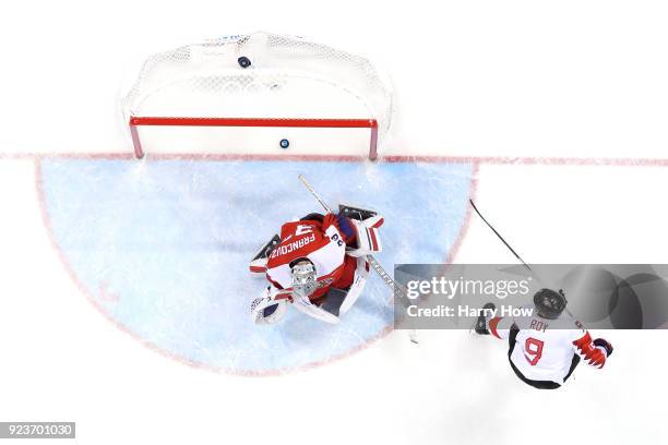 Derek Roy of Canada scores a goal against Pavel Francouz of the Czech Republic in the first period during the Men's Bronze Medal Game on day fifteen...