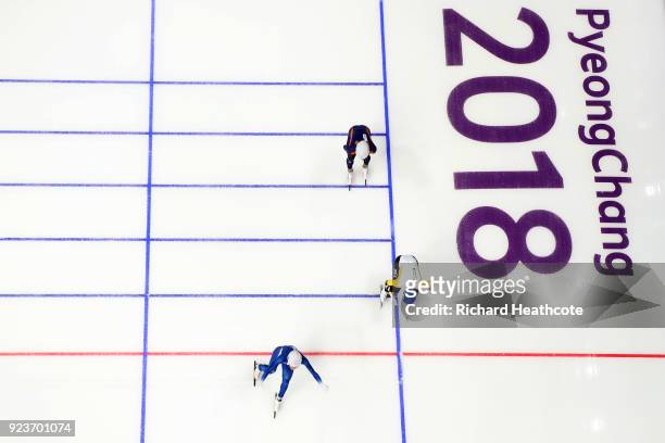 Seung-Hoon Lee of Korea crosses the finish line ahead of Bart Swings of Belgium and Koen Verweij of Netherlands to win the gold medal during the...