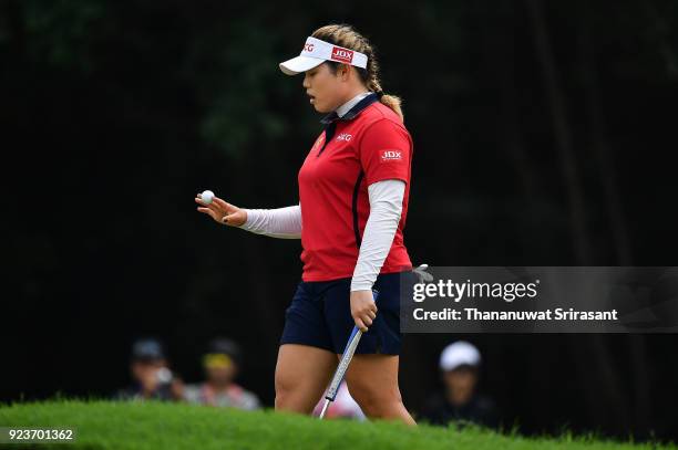 Ariya Jutanugarn of Thailand holds the golf ball during the Honda LPGA Thailand at Siam Country Club on February 24, 2018 in Chonburi, Thailand.