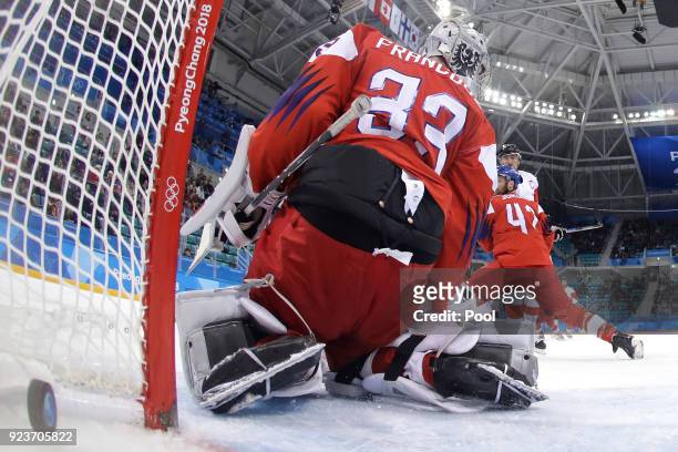 Pavel Francouz of the Czech Republic allows a goal against Chris Kelly of Canada in the first period during the Men's Bronze Medal Game on day...