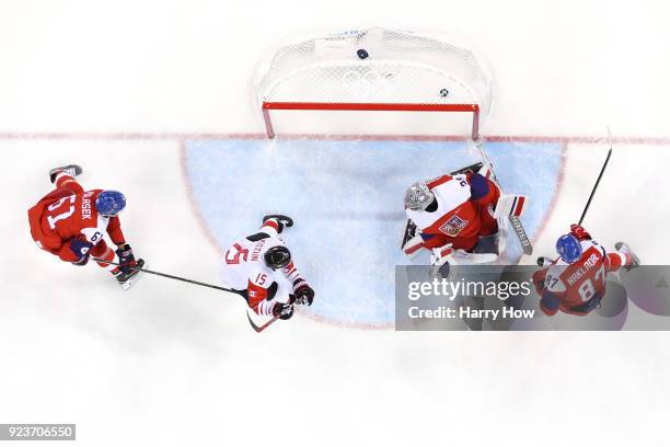 Derek Roy of Canada scores a goal against Pavel Francouz of the Czech Republic in the first period during the Men's Bronze Medal Game on day fifteen...