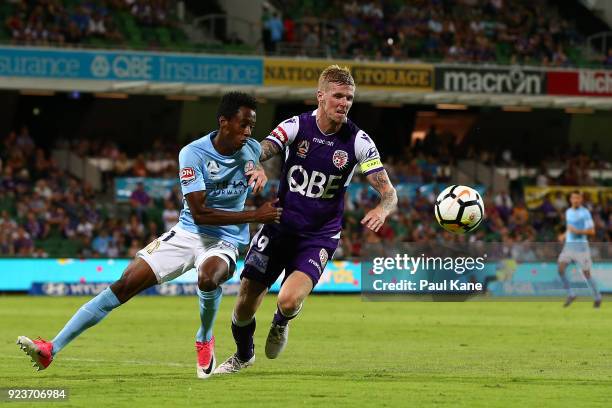 Bruce Kamau of Melbourne and Andy Keogh of the Glory contest for the ball during the round 21 A-League match between the Perth Glory and Melbourne...