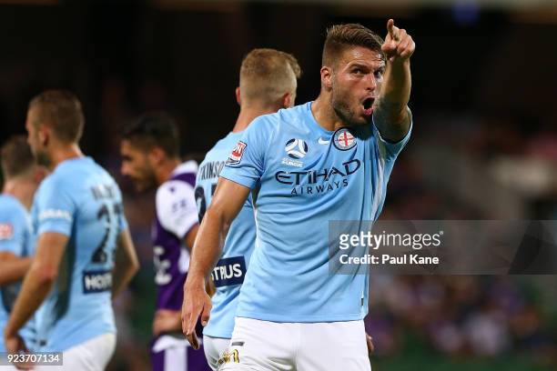 Bart Schenkeveld of Melbourne remonstrates with referee Shaun Evans after being shown a yellow card during the round 21 A-League match between the...
