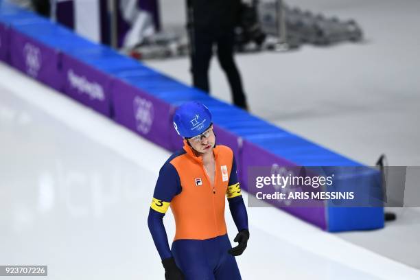 Netherlands' Koen Verweij reacts after the men's mass start final speed skating event during the Pyeongchang 2018 Winter Olympic Games at the...