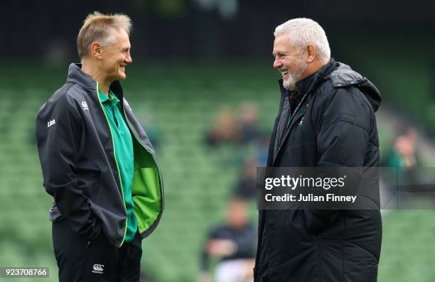 Joe Schmidt of Ireland talks with Warren Gatland of Wales during the NatWest Six Nations match between Ireland and Wales at Aviva Stadium on February...