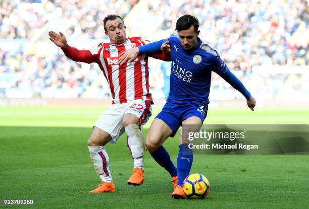 Ben Chilwell of Leicester City is challenged by Xherdan Shaqiri of Stoke City during the Premier League match between Leicester City and Stoke City...