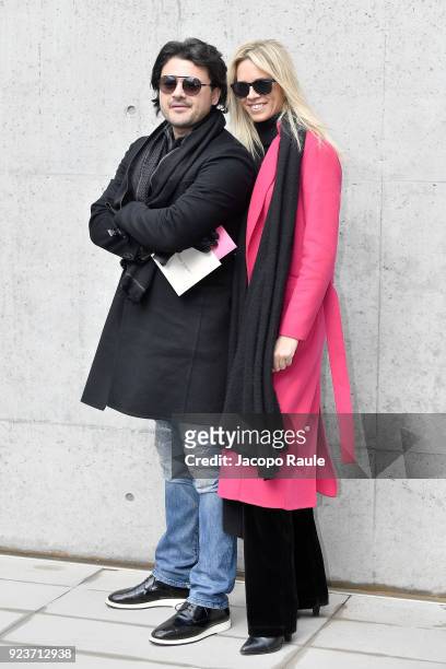 Vittorio Grigolo and guest attend the Giorgio Armani show during Milan Fashion Week Fall/Winter 2018/19 on February 24, 2018 in Milan, Italy.