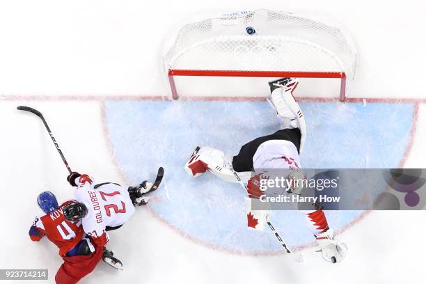 Kevin Poulin of Canada makes a save against Jan Kovar of the Czech Republic in the second period during the Men's Bronze Medal Game on day fifteen of...