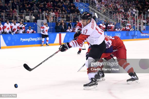 Rene Bourque of Canada shoots against Tomas Kundratek of the Czech Republic in the second period during the Men's Bronze Medal Game on day fifteen of...