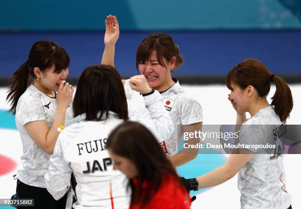 Winner of the bronze medal, Satsuki Fujisawa, Chinami Yoshida, Yumi Suzuki and Yurika Yoshida of Japan celebrate following the Curling Womens' bronze...
