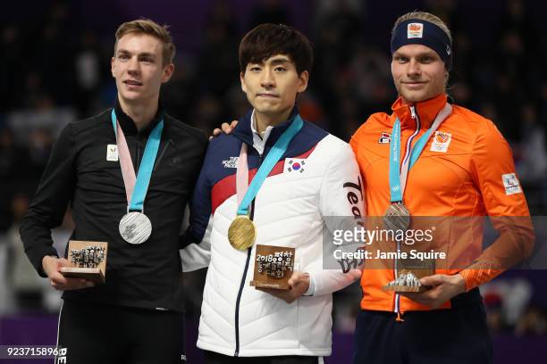 Silver medalist Bart Swings of Germany, gold medalist Seung-Hoon Lee of Korea and bronze medalist Koen Verweij of Netherlands stand on the podium...