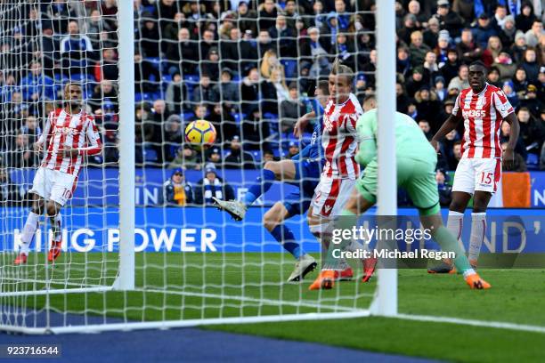 Jack Butland of Stoke City scores an own goal during the Premier League match between Leicester City and Stoke City at The King Power Stadium on...