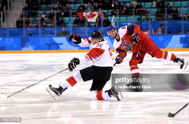 Tomas Kundratek of the Czech Republic fires the puck against Christian Thomas of Canada in the third period during the Men's Bronze Medal Game on day...