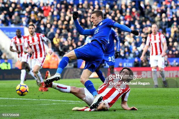 Joe Allen of Stoke City tackles Jamie Vardy of Leicester City during the Premier League match between Leicester City and Stoke City at The King Power...