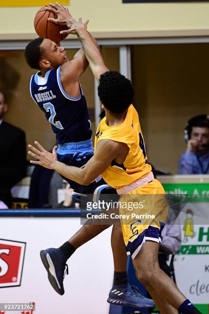 Fatts Russell of the Rhode Island Rams is guarded by Pookie Powell of the La Salle Explorers during the second half at Tom Gola Arena on February 20,...