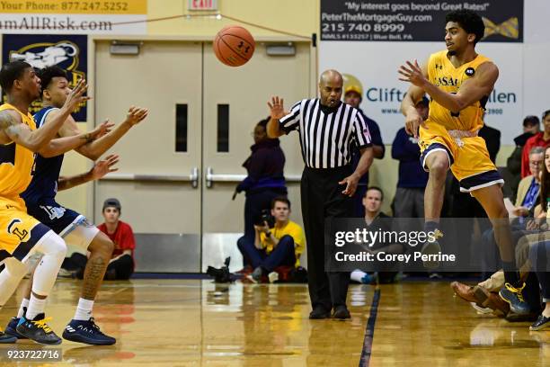 Pookie Powell of the La Salle Explorers can't make a save against the Rhode Island Rams during overtime at Tom Gola Arena on February 20, 2018 in...