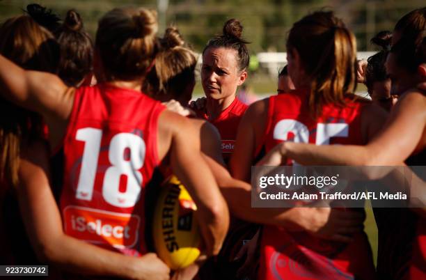 Daisy Pearce of the Demons addresses her teammates during the 2018 AFLW Round 04 match between the Melbourne Demons and the Collingwood Magpies at...