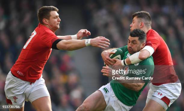 Dublin , Ireland - 24 February 2018; Rob Kearney of Ireland is tackled by Steff Evans of Wales during the NatWest Six Nations Rugby Championship...