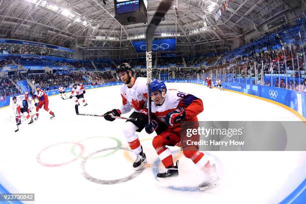 Cody Goloubef of Canada competes for the puck with Tomas Mertl of the Czech Republic in the third period during the Men's Bronze Medal Game on day...