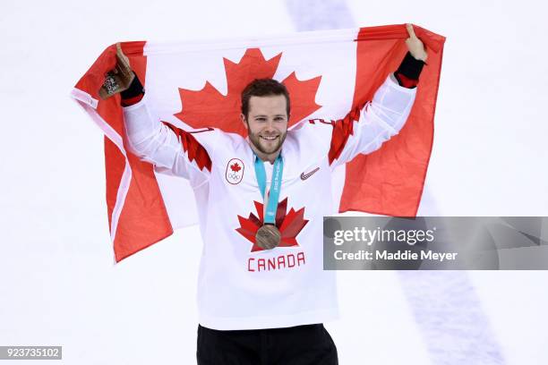 Bronze medal winner Cody Goloubef of Canada celebrates after defeating Czech Republic 6-4 during the Men's Bronze Medal Game on day fifteen of the...